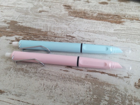 Pastel fountain pen with push button