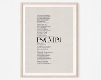 May include: A framed print featuring the text of Psalm 139 in a minimalist design. The text is in black, with the title "PSALM 139" prominently displayed. The background is a light beige color, and the frame is a light wood color.