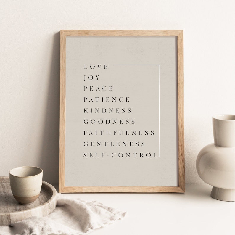 May include: A framed print with a beige background and black text. The text reads "Love, Joy, Peace, Patience, Kindness, Goodness, Faithfulness, Gentleness, Self Control".