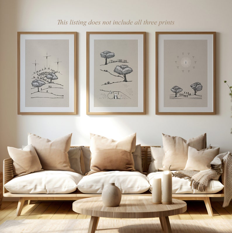 May include: Three framed black and white illustrations of trees, people, and a cross. The illustrations are on a beige background and are hung on a white wall above a light brown couch with beige pillows.