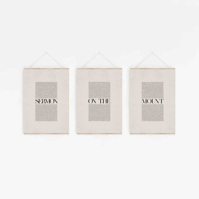 May include: Three framed prints with the text "SERMON ON THE MOUNT" printed in black on a beige background.