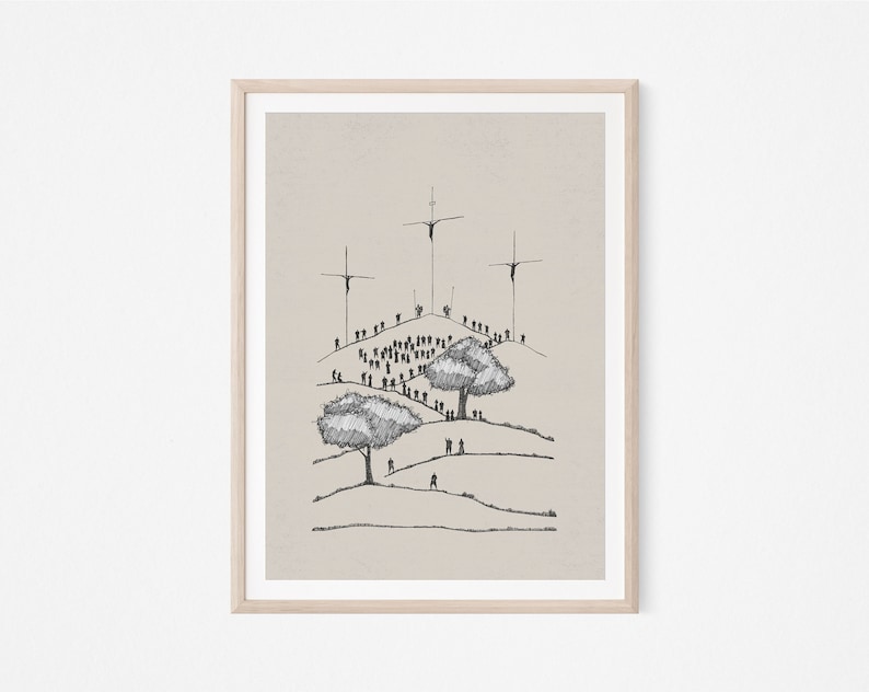 May include: A black and white line drawing of a crowd of people gathered on a hill with three crosses at the top. The drawing is framed in a light wood frame.
