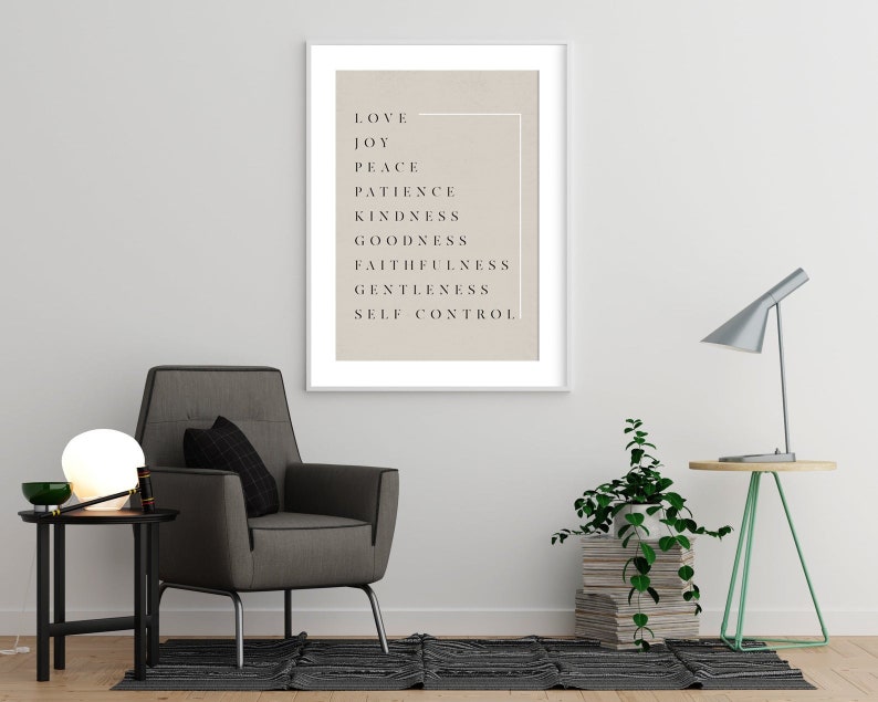 May include: A framed print with a beige background and black text. The text reads "Love, Joy, Peace, Patience, Kindness, Goodness, Faithfulness, Gentleness, Self Control."