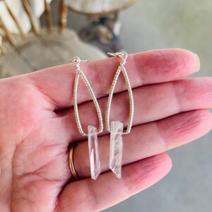 sterling silver and clear quartz earrings.