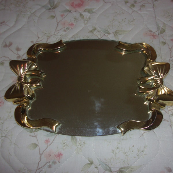 Vintage vanity mirror tray with gold bow handles and oval mirror