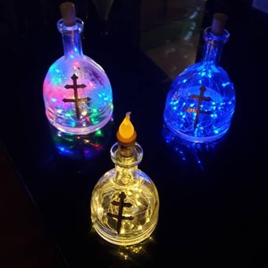 Lámparas de antorcha Tiki con forma de botella de coñac D&#39;usse / Botellas de coñac reutilizadas e iluminadas