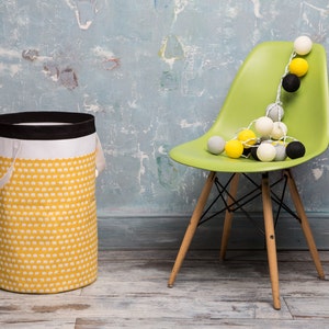Gele olifantenmand. Mand voor speelgoed. Kinderkamermand.