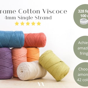 May include: Six spools of 4mm macrame cord in various colours, including purple, teal, peach, cream, orange, and yellow. The cord is made of cotton and viscose and is 100 metres (328 feet) long. The text "Macrame Cotton Viscoce 4mm Single Strand" is visible at the top of the image.