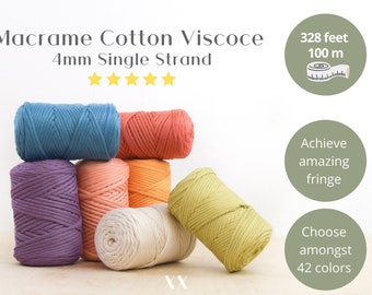 May include: Six spools of 4mm macrame cord in various colors, including purple, teal, peach, cream, orange, and yellow. The cord is made of cotton and viscose and is 328 feet (100 meters) long. The text "Macrame Cotton Viscoce 4mm Single Strand" is visible at the top of the image.
