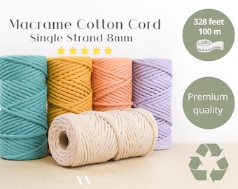 May include: Five spools of 8mm macrame cotton cord in various colors, including teal, yellow, peach, lavender, and natural. The cord is 328 feet (100 meters) long and is made of premium quality cotton. The image also includes a recycling symbol.