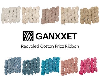 May include: A collection of recycled cotton frizz ribbon in various colors, including natural, beige, light brown, blue, teal, pink, and red. The ribbon is made from recycled cotton and is perfect for crafting and decorating. GANXXET Recycled Cotton Frizz Ribbon.