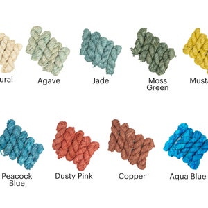 May include: Ten skeins of hand-dyed yarn in various colors, including natural, agave, jade, moss green, mustard, peacock blue, dusty pink, copper, and aqua blue.