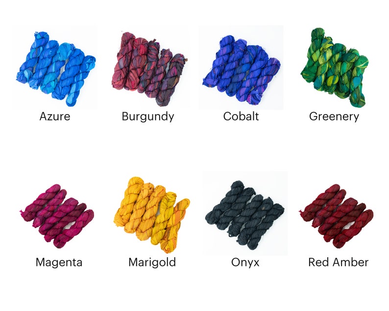 May include: Eight spools of colorful silk thread, each tied in a knot. The colors are azure, burgundy, cobalt, greenery, magenta, marigold, onyx, and red amber.
