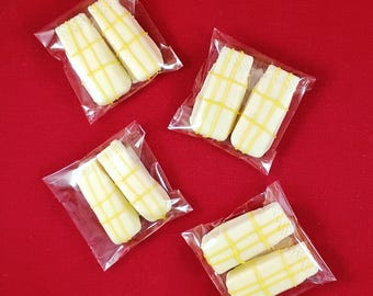 Lemon Wafers covered in White Chocolatey Goodness. (Includes 2 Lemon Wafers per bag)