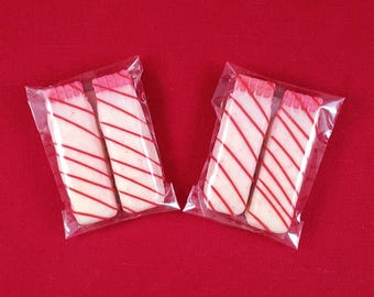 Strawberry Wafers covered in White Chocolatey Goodness. (Includes 2 Wafers)