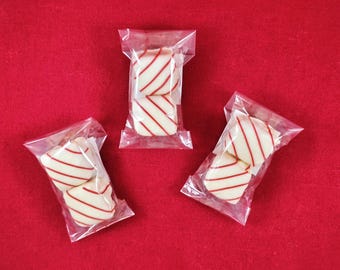 Pound Cake Bites dipped in Strawberry White Chocolatey Goodness. (Includes 2 Pound Cake Bites (Approx. 1" Squares))
