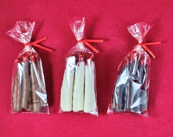 Strawberry Licorice covered in Chocolatey Goodness. (Includes 8 pieces per bag)