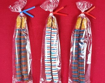 Crunchy Pretzel Rods covered in Chocolatey Goodness. (Includes 2 per bag)