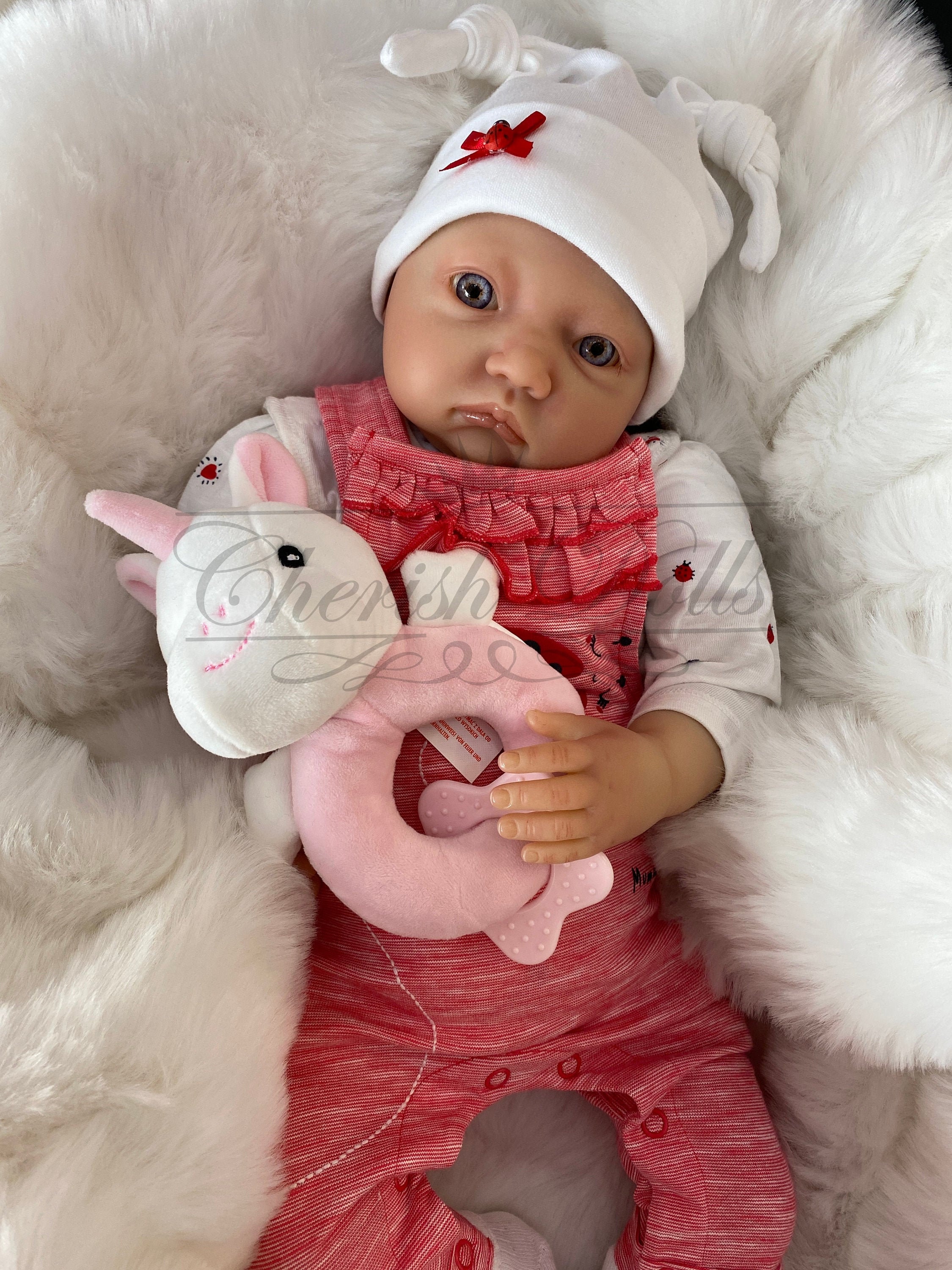 newborn size baby doll