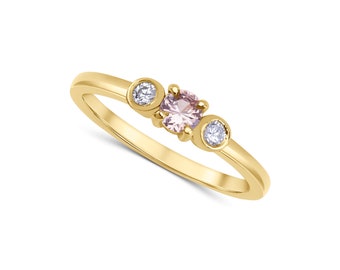 Pastel pink sapphire and diamond ring in 9ct yellow gold