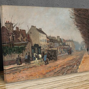 May include: A painting depicting a street scene in a town. The street is lined with buildings and trees. People are walking along the street, and a horse-drawn cart is in the centre of the street. The painting is rendered in a muted colour palette, with shades of grey, brown, and blue. The artist's signature, "Sisley", is visible in the bottom right corner.