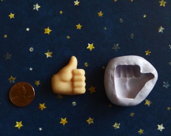 Moule en silicone en forme de main faisant un pouce levé, pour bonbons et gâteaux.