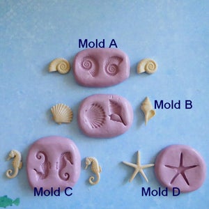 K&ouml;nnte beinhalten: Eine Auswahl an Muschel-Themenformen und fertigen Produkten. Das Bild zeigt vier rosa Formen mit den Bezeichnungen A bis D, jede mit einem anderen Muscheldesign. Begleitend zu den Formen sind fertige Muschelg&uuml;sse in Creme- und Beiget&ouml;nen, darunter ein Seestern und Seepferdchen.