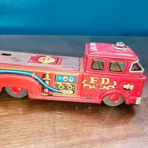 1950s Japanese Tin Fire truck for PARTS. image 1