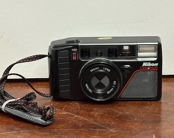 Vintage Nikon One Touch Camera