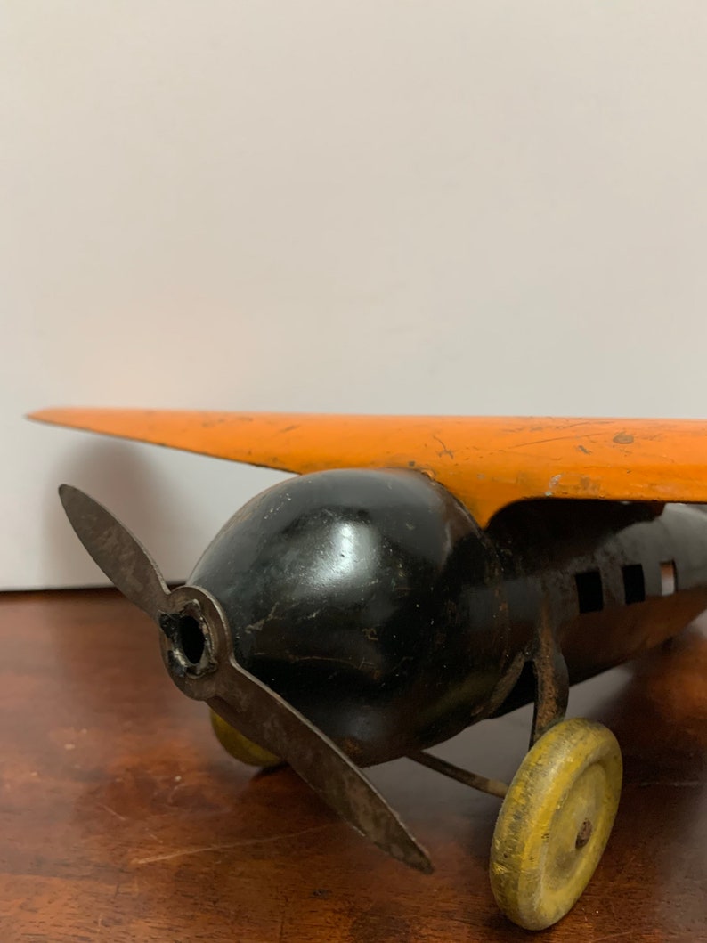 1930s Wyandotte Pressed Metal Orange Plane image 5