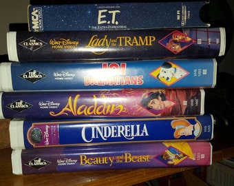 50 percent off Sale!!! Lot of 5 Original Cut Vintage Black Diamond Collection Disney VHS tapes in Clamshell Cases. Bonus ET VHS included!