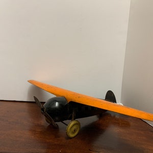 1930s Wyandotte Pressed Metal Orange Plane image 2