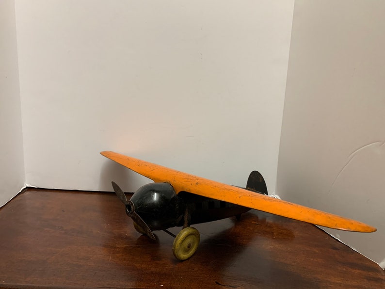 1930s Wyandotte Pressed Metal Orange Plane image 2