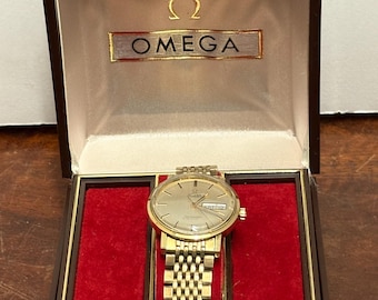 1960s Omega Automatic Seamaster De Ville Watch with Date. Box and papers included.