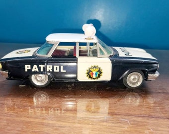 Sale! 1950s Ichiko Friction Police Car in WORKING condition.