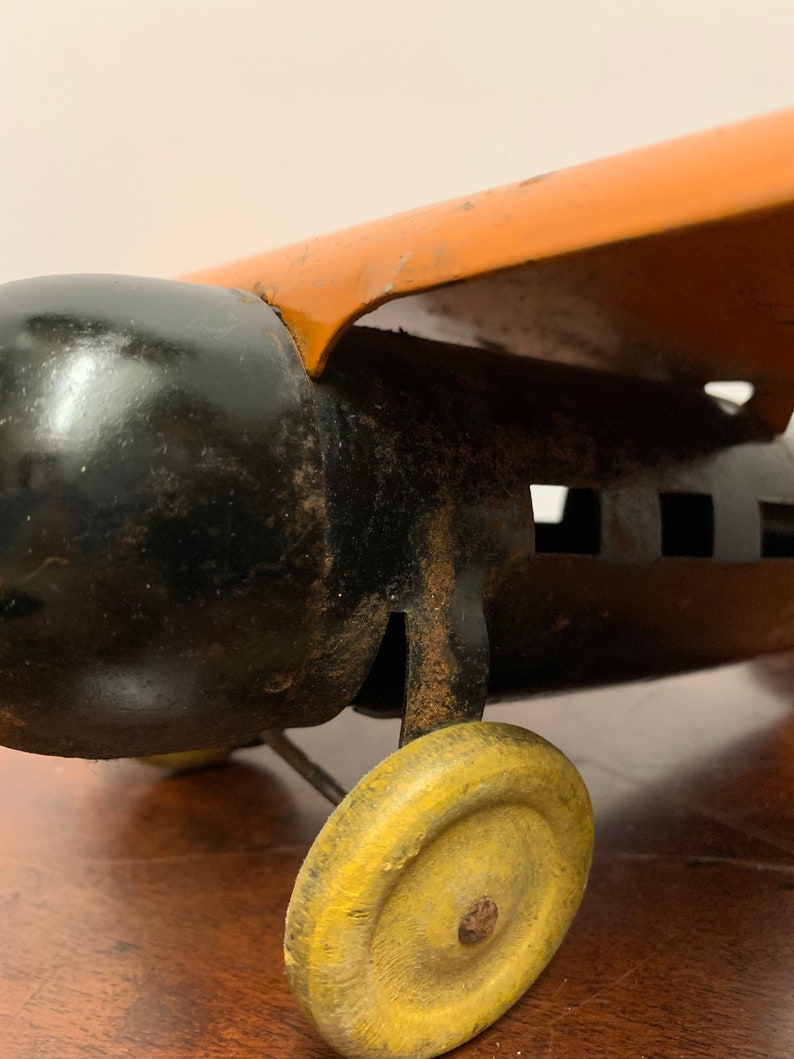 1930s Wyandotte Pressed Metal Orange Plane image 7