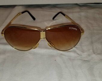 Vintage 80s folding Ferrari Aviator sunglasses. Mint Condition.