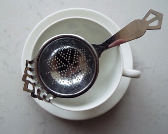 Vintage Tea Strainer. 1960s loose leaf tea infuser. Retro chrome tea strainer for sitting on a teacup. Perfect for an afternoon tea party!