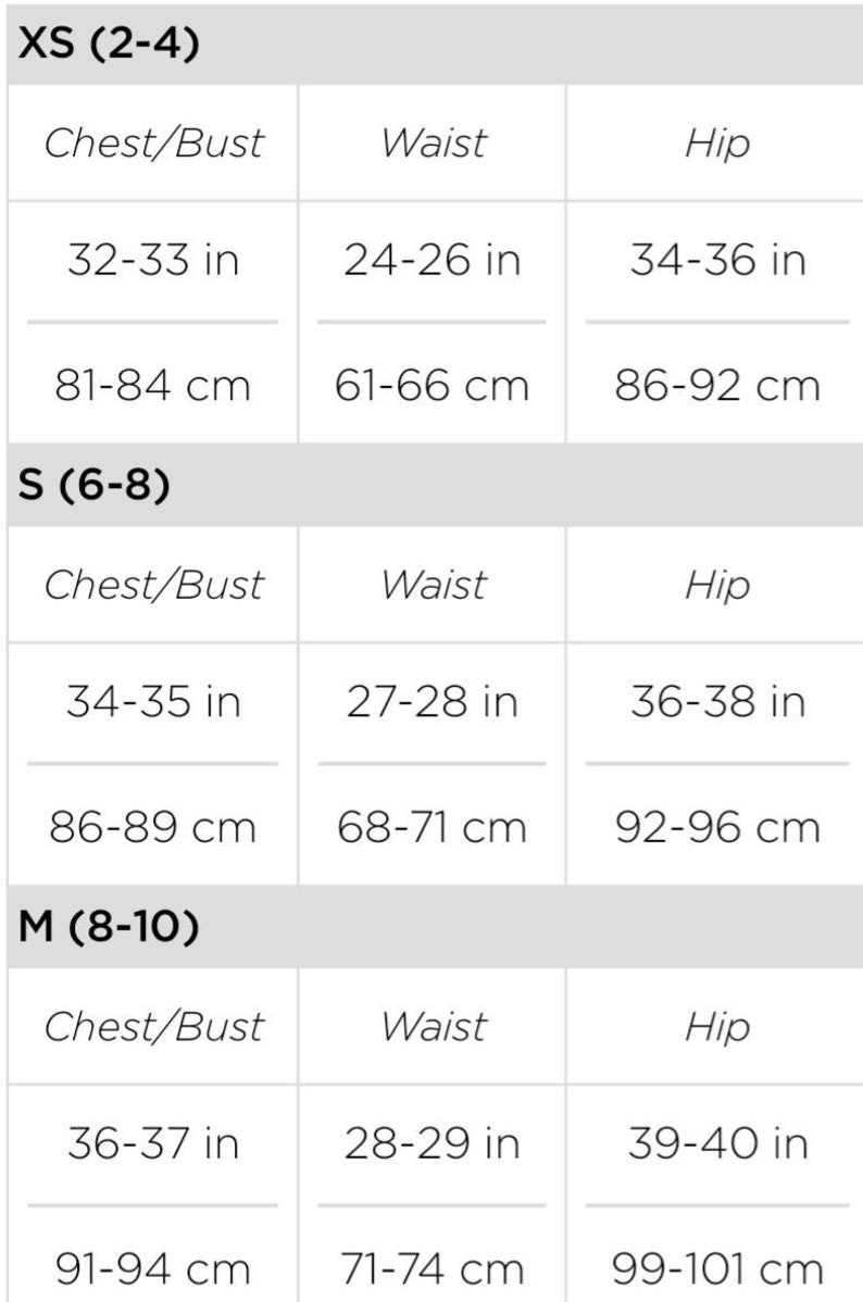 May include: Size chart showing measurements in inches and centimeters for sizes XS, S, and M. The chart shows chest/bust, waist, and hip measurements.