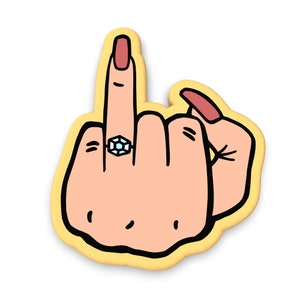 Puede incluir: Una ilustración de dibujos animados de una mano haciendo el dedo medio, con un anillo de diamantes en el dedo medio.