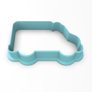 May include: A light blue plastic cookie cutter shaped like a van. The cutter has a rounded front and back, and a flat bottom.