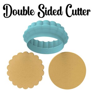 May include: A blue plastic cookie cutter with a scalloped edge. Two cookies are shown, one with the scalloped edge and one plain.