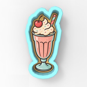 May include: A cartoon-style illustration of a pink milkshake in a tall glass, topped with whipped cream, sprinkles, a cherry, and a striped straw. The image is outlined in brown and set against a light blue background.