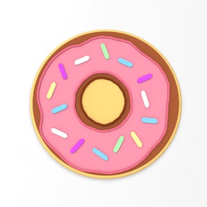 May include: A pink donut with brown frosting and colorful sprinkles. The donut is on a white background.