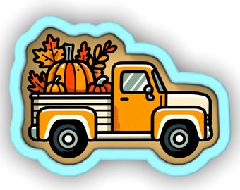 May include: A cartoon illustration of a yellow pickup truck with a bed full of orange pumpkins. The truck has a blue outline and is set against a brown background.