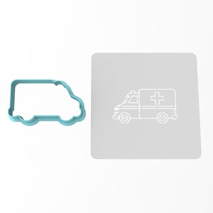 May include: A light blue plastic cookie cutter shaped like an ambulance. The cutter is next to a white stencil of an ambulance with a red cross on the side.
