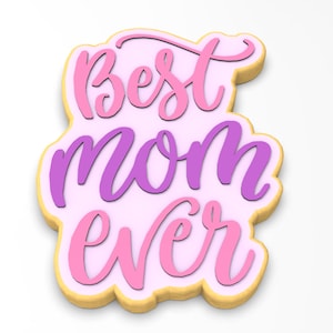 May include: A pink and purple cookie with the words "Best mom ever" written in cursive.