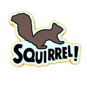 May include: A yellow and blue sticker with a brown silhouette of a squirrel and the text "SQUIRREL!" in black.