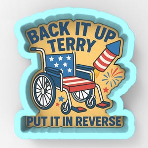 May include: A light blue cookie cutter with the text "BACK IT UP TERRY PUT IT IN REVERSE". The design features a wheelchair with an American flag theme, a rocket, and fireworks.