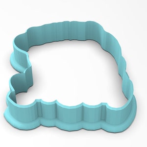 May include: A light blue plastic cookie cutter shaped like a cloud with a scalloped edge.